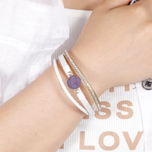 Multilayer bracelet with purple crystal, white woven rope, and gold diamond chain