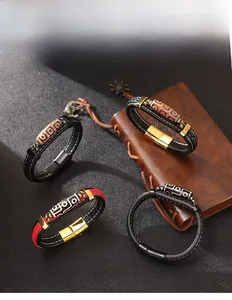 Detailed shot of ethnic braided leather bracelets with totem beads and magnetic clasps