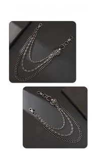 Detail of multi-layer biker waist chain with retro floral leather charm and hooks