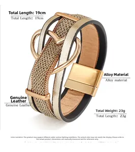 Détail du bracelet en cuir tressé avec breloque cœur et fermoir magnétique doré