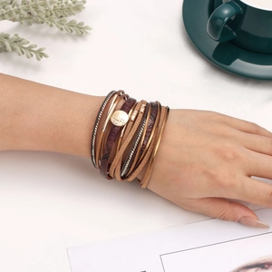 Multilayer bohemian faux leather wrap bracelet with gold metal charms and magnetic clasp
