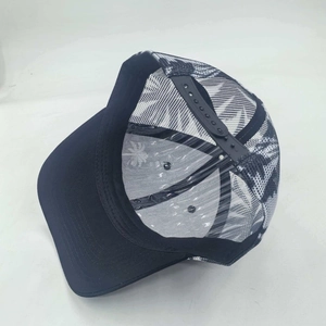 Black trucker hat with palm tree print mesh and adjustable strap back view
