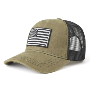 Olive green and black mesh baseball cap with American flag patch in a side view
