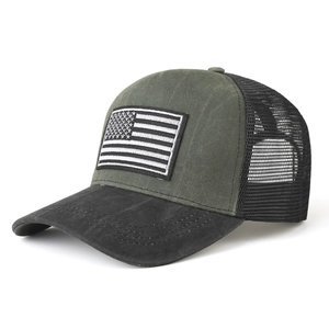 Detail of army green trucker hat with breathable mesh back and American flag patch
