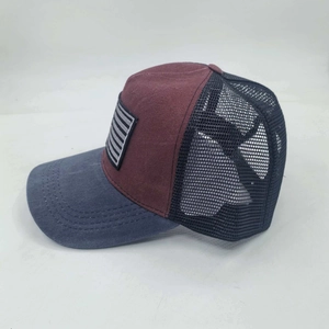 Side view of multi-color trucker hat with mesh back and patriotic stripes patch