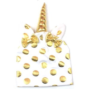 Detail of unicorn knit baby hat with golden metallic dots and shiny golden horn