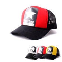 Detail view of breathable trucker hats with star print and Started 1908 text in various colors