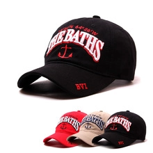 Detailed 3D embroidery of the anchor and THE BATHS text on cotton baseball caps