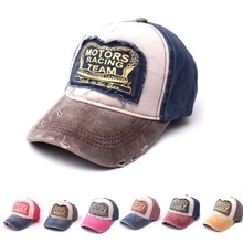 Detail view of vintage washed canvas baseball cap with motors racing embroidery patch