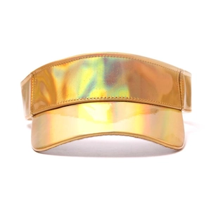 Close-up of golden holographic sun visor hat with metallic finish and wide brim