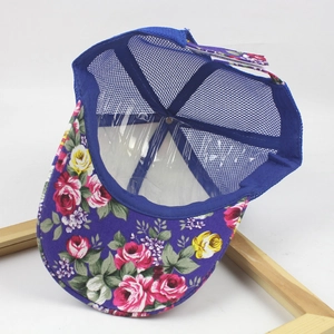 Close-up of floral print baseball cap with purple roses and blue mesh back panel