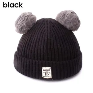 Black ribbed knit baby beanie with double grey faux fur pom-poms and Moonlight label