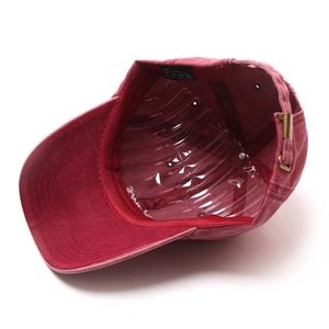 Detail view of cotton vintage baseball cap inner lining and adjustable metal buckle