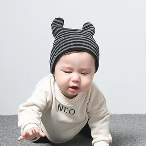 Striped baby knit hat with cute ears for infants in soft black and grey striped pattern