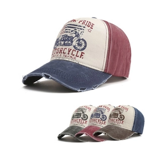 Close-up of vintage embroidery and distressed brim on the motorcycle baseball cap