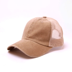 Distressed khaki mesh trucker hat featuring breathable washed cotton and a curved brim
