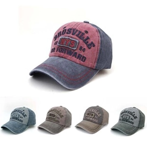 Multiple colors of washed canvas baseball caps with vintage embroidery and distressed details