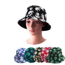 Stack of colorful leopard leaf pattern bucket hats in red blue yellow and green colors