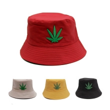 Outdoor cotton bucket hats with leaf embroidery available in red, beige, yellow, and black