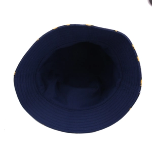 Detail of banana print bucket hat showing dark navy interior and reinforced brim stitching