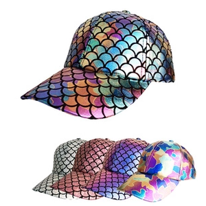 Detail of metallic mermaid fish scale pattern on hip hop baseball caps in various colors