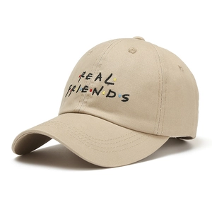 Khaki cotton baseball cap with REAL FRIENDS embroidery and colorful dot details
