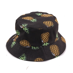 Double-sided reversible sun hat with vibrant yellow pineapple pattern on black canvas
