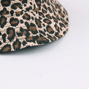 Fashionable leopard print bucket hat made of canvas fabric with detailed stitching