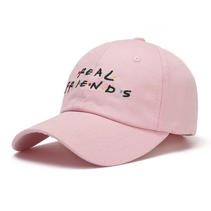 Pink canvas baseball cap with colorful Real Friends embroidery and curved brim for unisex