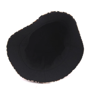 Reversible leopard print bucket hat for men and women featuring solid black inner lining