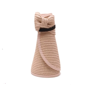 Rollable wide brim straw sun hat for women in light pink with black elastic strap