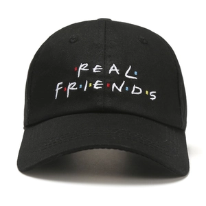 Classic black baseball cap with colorful REAL FRIENDS embroidery on a white background