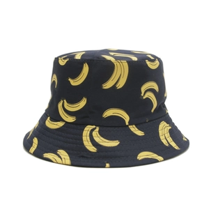 Reversible navy bucket hat with yellow banana print for sun protection and outdoor leisure