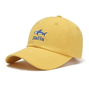 Yellow cotton baseball cap with blue shark embroidery and HaHa text design