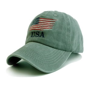 Close-up of USA embroidery and flag detail on vintage washed cotton green baseball cap