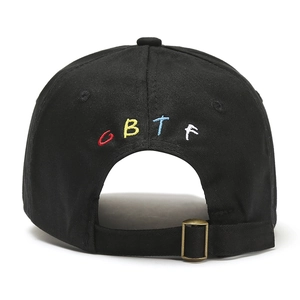 Detail of colorful CBTF embroidery on black canvas baseball cap with metal buckle