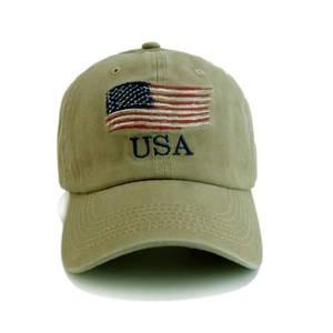 Detail of USA lettering and American flag embroidery on khaki washed cotton baseball cap