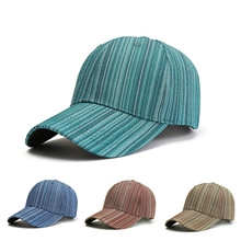 Close-up of striped baseball caps showing vertical weave textures in four distinct colors