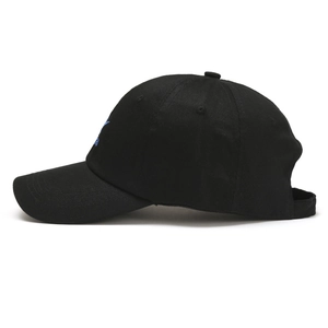 Side view of black cotton baseball cap with blue embroidery and curved brim detail