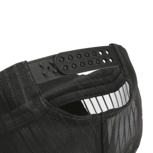 Detail of the adjustable snapback closure on black mesh trucker cap for breathable sun protection