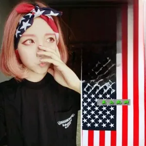 Detail view of American flag pattern headwrap showing red white and blue stars and stripes