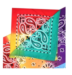 Detail shot of colorful paisley cotton square bandanas with intricate stitching and gradient hues