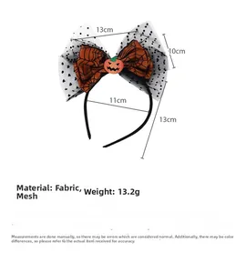 Detail view of Halloween pumpkin bow headband showing exact dimensions and materials used