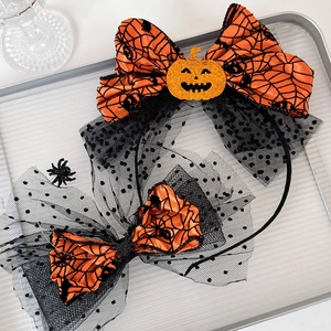 Halloween pumpkin headband and hair clip set with orange satin bow and spider web pattern