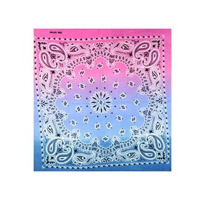 Detail showing the pink to deep blue gradient paisley pattern on 100% cotton square bandana