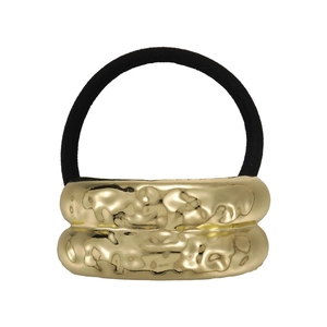 Minimalist elastic hair tie with textured geometric gold metal rings on white background