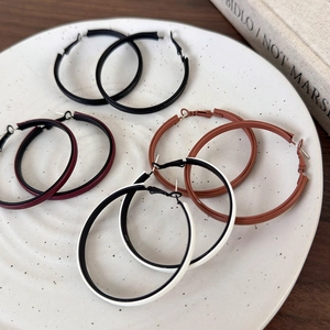 Chic wide matte hoop earrings in black, wine red, and brown leather-look finish