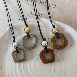 Retro Artistic Camel Bone Pendant Necklace With Metal Bead Irregular Ring Long Wax Rope Sweater Chain Jewelry For Women