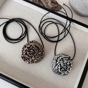 Leopard print rose choker with black tie cord in brown and white fabric options