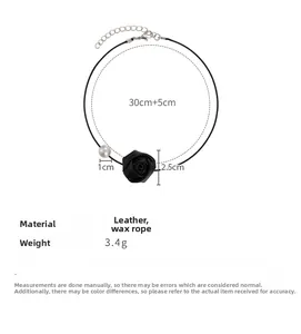 Detail view of a black leather rose choker with a white pearl and dimensions shown